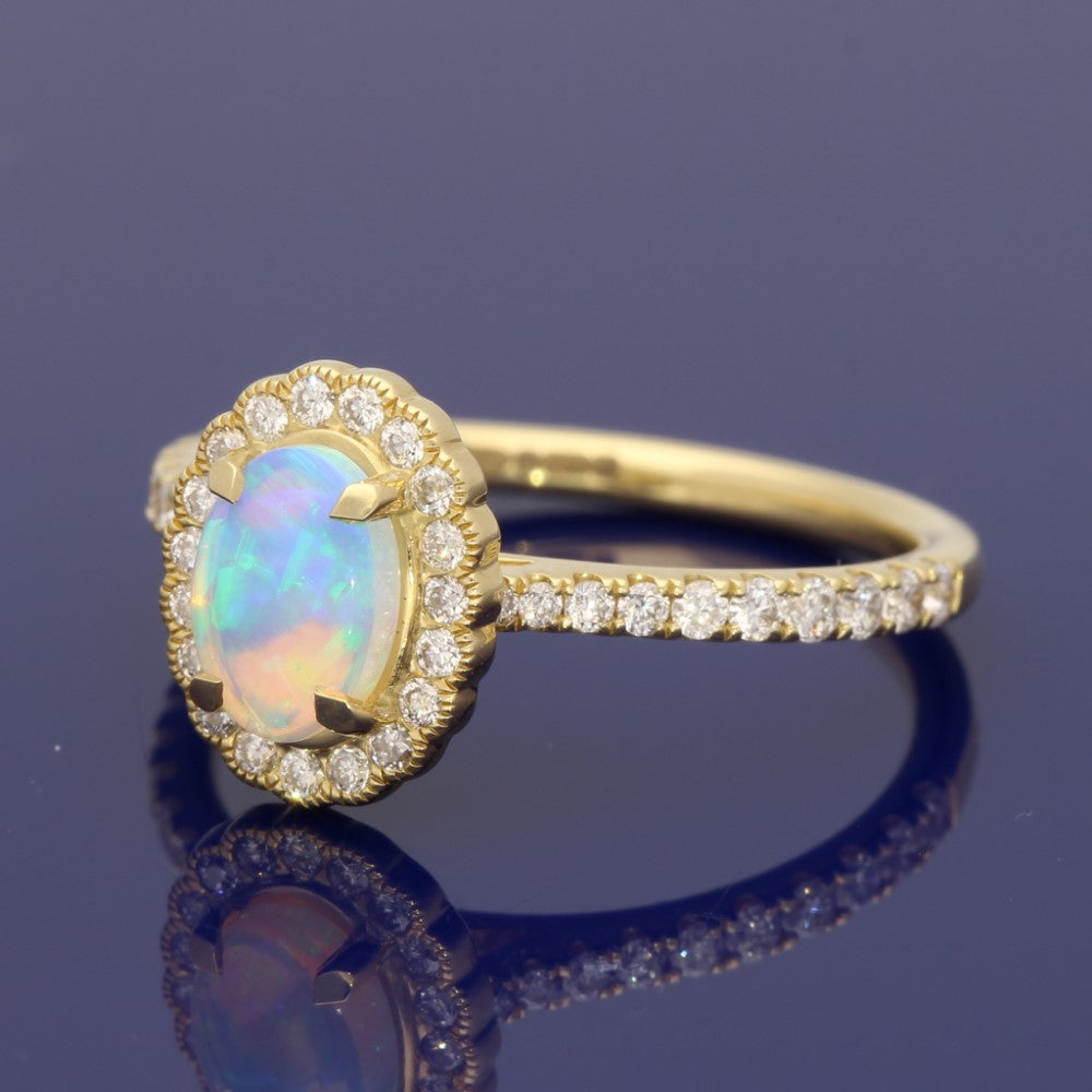 18ct Yellow Gold Oval Opal and Diamond Halo Ring